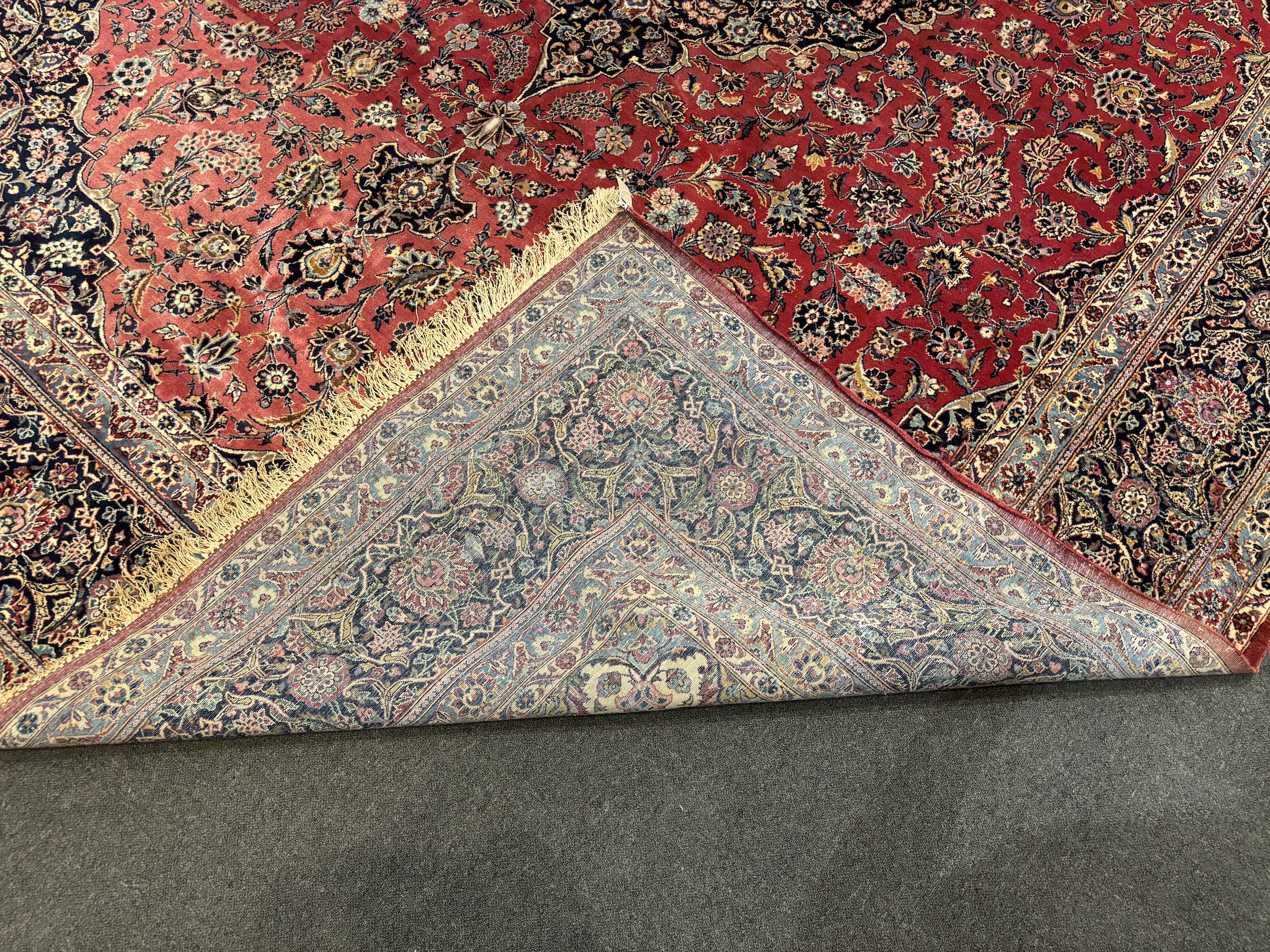 A Persian Kashan carpet 430 x 315cm